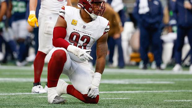 Washington Commanders defensive tackle Jonathan Allen (93) waits for a snap against the Seattle Seahawks during the second quarter at Lumen Field.