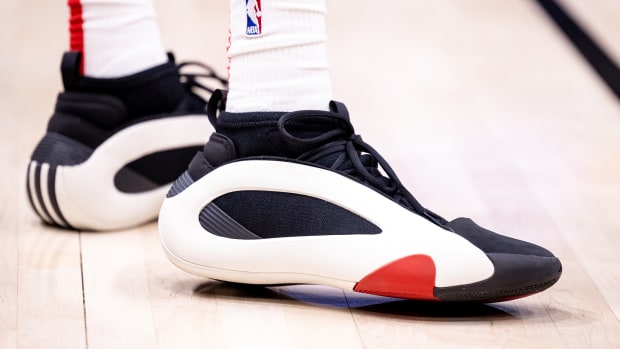 Houston Rockets forward Jabari Smith Jr.'s white and black adidas sneakers.