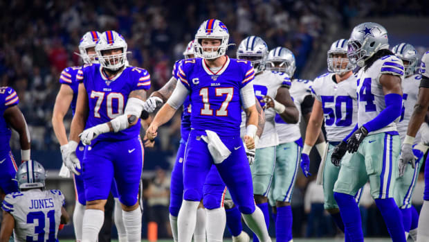 Bills quarterback Josh Allen celebrates after a big play against the Cowboys.