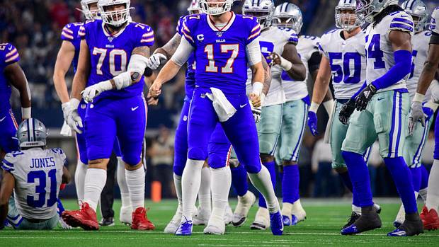 Bills quarterback Josh Allen celebrates after a big play against the Cowboys.