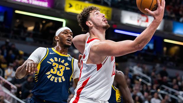 Rockets center Alperen Sengun (28) shoots the ball while Indiana Pacers center Myles Turner (33) defends in the first half at Gainbridge Fieldhouse.