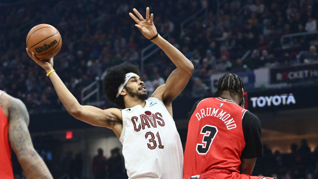 Cleveland Cavaliers center Jarrett Allen (31) shoots over the defense of Chicago Bulls center Andre Drummond (3) during the first half at Rocket Mortgage FieldHouse.