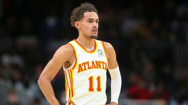 Atlanta Hawks guard Trae Young looks on during a game.
