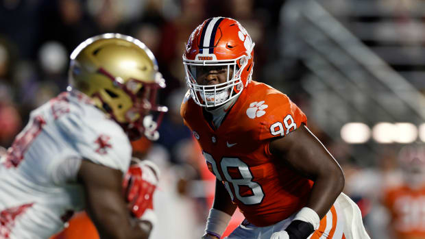 Clemson Tigers defensive end Myles Murphy (98) eyes a Boston College Eagles ball carrier during the second quarter at Alumni Stadium.