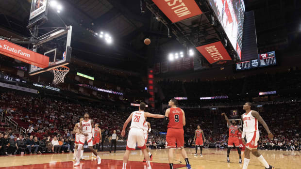 Chicago Bulls guard Patrick Beverley (21) shoots a three point shot against the Houston Rockets in the second quarter at Toyota Center.
