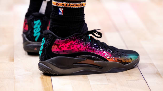 New Orleans Pelicans forward Zion Williamson's black and red Jordan Brand sneakers.