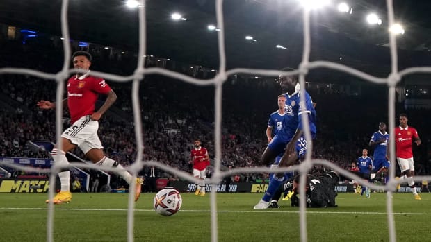 Jadon Sancho (left) pictured rolling a shot into the net to score Manchester United's winning goal in a 1-0 victory at Leicester in September 2022