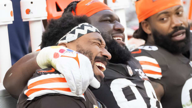 Nov 5, 2023; Cleveland, Ohio, USA; Cleveland Browns defensive end Myles Garrett (95) and defensive tackle Dalvin Tomlinson (94) celebrate during the second half against the Arizona Cardinals at Cleveland Browns Stadium.