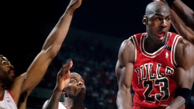 Jun 1992; Chicago Bulls superstar Michael Jordan in action against Portland Trailblazers' Clyde Drexler during the 1992 NBA Finals at the Rose Garden