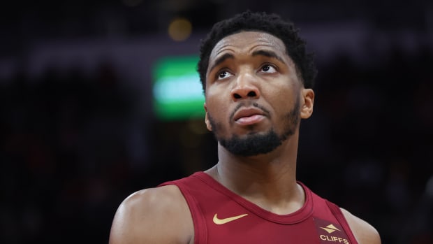 Mar 16, 2024; Houston, Texas, USA; Cleveland Cavaliers guard Donovan Mitchell (45) looks at the replay board while playing against the Houston Rockets in the second half at Toyota Center. Mandatory Credit: Thomas Shea-USA TODAY Sports