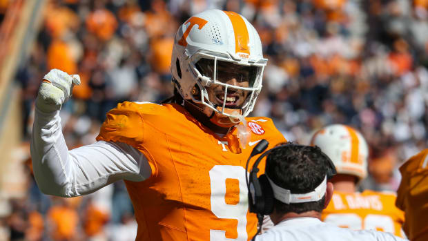Nov 4, 2023; Knoxville, Tennessee, USA; Tennessee Volunteers defensive lineman Tyler Baron (9) celebrates after returning a fumble for a touchdown against the Connecticut Huskies during the first half at Neyland Stadium. Mandatory Credit: Randy Sartin-USA TODAY Sports