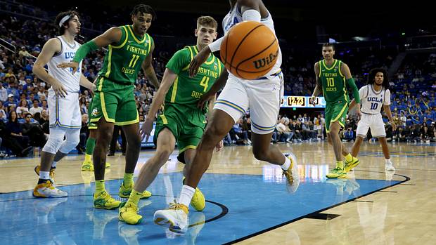 UCLA Bruins forward Kenneth Nwuba chases the loose ball against the Oregon Ducks.