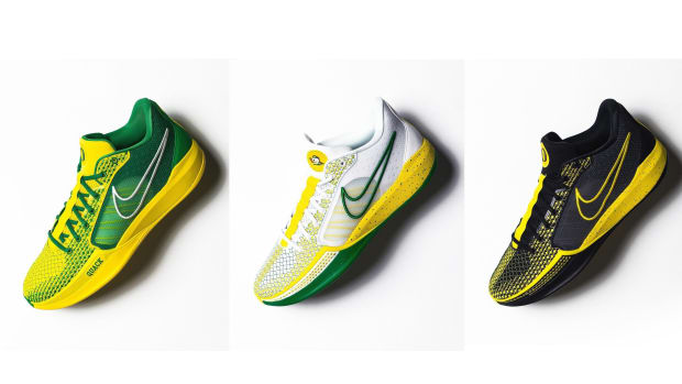 Side view of the Oregon Ducks basketball team's green and yellow Nike sneakers.
