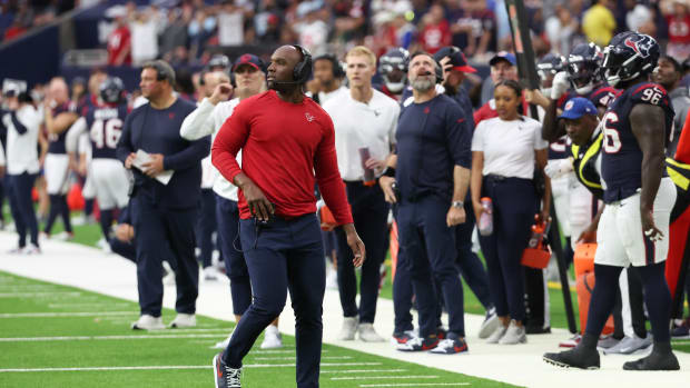 Texans head coach DeMeco Ryans throws the challenge flag on a play as the Texans play against the Tampa Bay Buccaneers in the fourth quarter at NRG Stadium.
