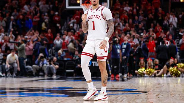 Indiana Hoosiers guard Jalen Hood-Schifino celebrates during a game.