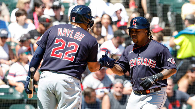 Jul 30, 2023; Chicago, Illinois, USA; Cleveland Guardians third baseman Jose Ramirez (11) celebrates with first baseman Josh Naylor (22) after hitting a solo home run against the Chicago White Sox during the fifth inning at Guaranteed Rate Field. Mandatory Credit: Kamil Krzaczynski-USA TODAY Sports