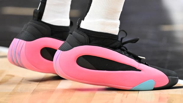 Los Angeles Clippers guard James Harden's black and pink adidas sneakers.
