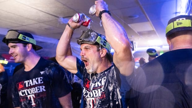 Sep 30, 2023; Seattle, Washington, USA; Texas Rangers celebrate in the clubhouse after clinching a post-season berth against the Seattle Mariners at T-Mobile Park. Mandatory Credit: Stephen Brashear-USA TODAY Sports  