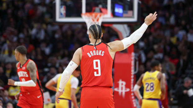 Houston Rockets forward Dillon Brooks (9) reacts after a play during the fourth quarter against the Los Angeles Lakers at Toyota Center.