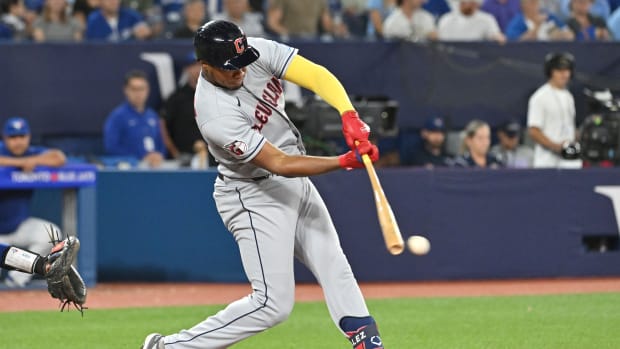 Aug 26, 2023; Toronto, Ontario, CAN; Cleveland Guardias left fielder Oscar Gonzalez (39) reaches base on an error by Toronto Blue Jays shortstop Santiago Espinal (not pictured) in the sixth inning at Rogers Centre.