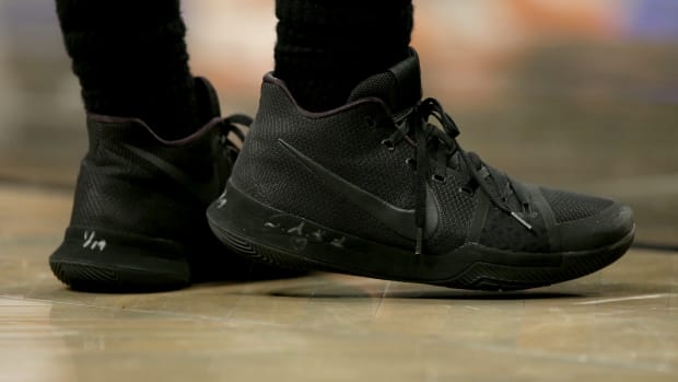 View of black Nike Kyrie shoes.