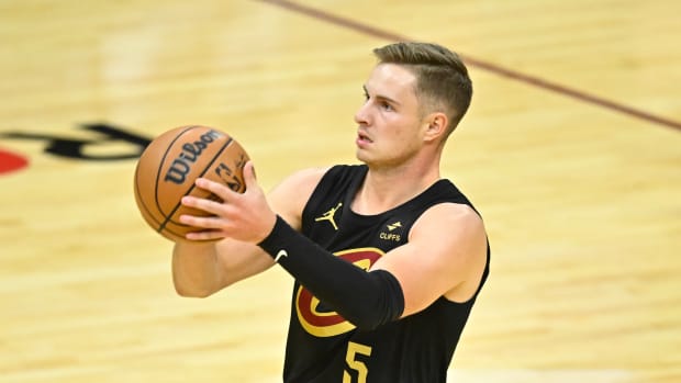 Oct 31, 2023; Cleveland, Ohio, USA; Cleveland Cavaliers guard Sam Merrill (5) shoots in the fourth quarter against the New York Knicks at Rocket Mortgage FieldHouse.