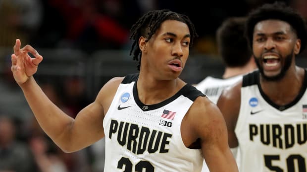 Purdue guard Jaden Ivey (23) celebrates a three-point basket during the second half in their second round game of the 2022 NCAA Men's Basketball Tournament Sunday, March 20, 2022 at Fiserv Forum in Milwaukee, Wis. Purdue beat Texas 81-71.