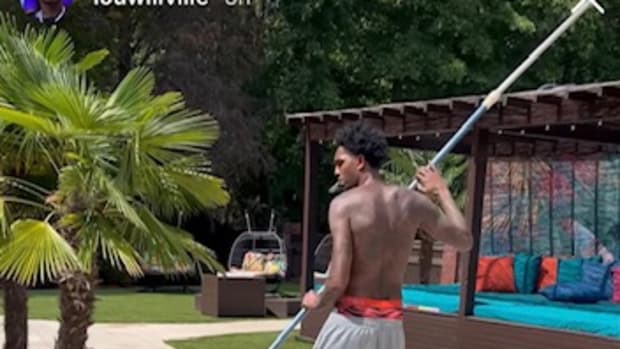 Lou Williams cleaning his pool.