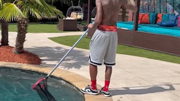 Lou Williams cleaning his pool.
