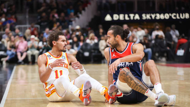 Atlanta Hawks guard Trae Young reacts after being fouled by Washington Wizards guard Xavier Cooks.