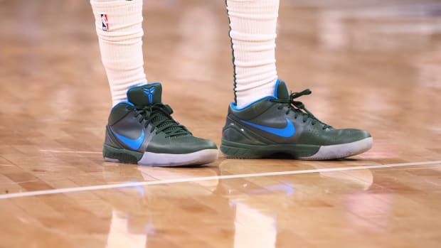 Milwaukee Bucks guard George Hill wears the Nike Kobe 4 Protro sneakers against the Sacramento Kings on March 16, 2022.