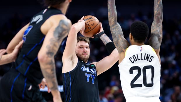 Dallas Mavericks guard Luka Doncic (77) looks to pass during the first quarter against the Utah Jazz at American Airlines Center.
