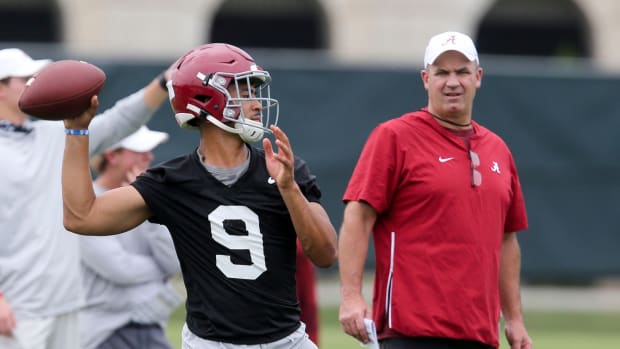 Alabama offensive coordinator Bill O'Brien working with Bryce Young.