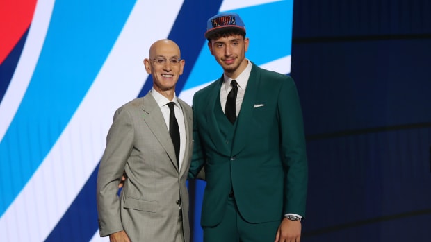 Alperen Sengun (Besiktas, Turkey) poses with NBA commissioner Adam Silver after being selected as the number sixteen overall pick by the Oklahoma City Thunder in the first round of the 2021 NBA Draft at Barclays Center.