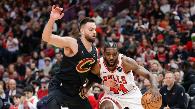 Dec 23, 2023; Chicago, Illinois, USA; Chicago Bulls forward Patrick Williams (44) drives to the basket against Cleveland Cavaliers guard Max Strus (1) during the first half at United Center. Mandatory Credit: Kamil Krzaczynski-USA TODAY Sports