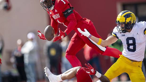 Indiana Hoosiers defensive back Devon Matthews (1) intercepts a ball meant for Michigan Wolverines wide receiver Ronnie Bell (8) in the end zone during the second half at Memorial Stadium. Wolverines won 31-10.