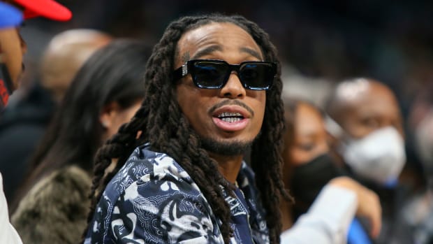 Jan 28, 2022; Atlanta, Georgia, USA; Rapper and entertainer Quavo watches a game between the Atlanta Hawks and Boston Celtics in the second quarter at State Farm Arena.