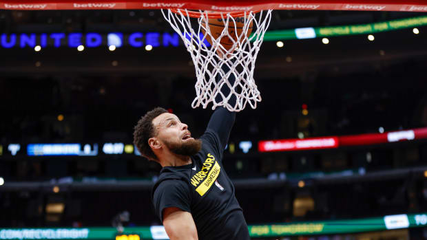 Jan 15, 2023; Chicago, Illinois, USA; Golden State Warriors guard Stephen Curry warms up before an NBA game against the Chicago Bulls at United Center.