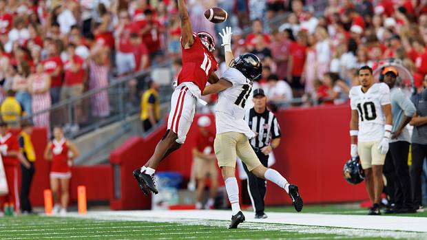 Wisconsin cornerback Alexander Smith in coverage against Purdue wide receiver Charlie Jones.