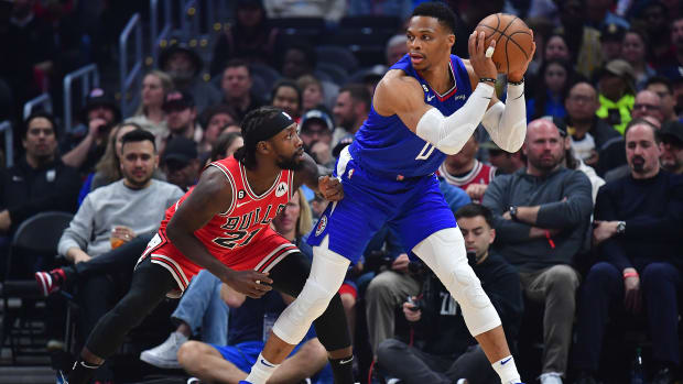 Mar 27, 2023; Los Angeles, California, USA; Los Angeles Clippers guard Russell Westbrook (0) moves the ball against Chicago Bulls guard Patrick Beverley (21)