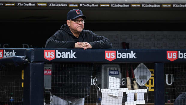 Jun 13, 2023; San Diego, California, USA; Cleveland Guardians manager Terry Francona (77) looks on from the dugout during the seventh inning against the San Diego Padres at Petco Park. Mandatory Credit: Orlando Ramirez-USA TODAY Sports