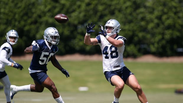 Tight end Jake Ferguson catching a pass in rookie mini-camp (Credit: Tim Heitman-USA TODAY Sports)