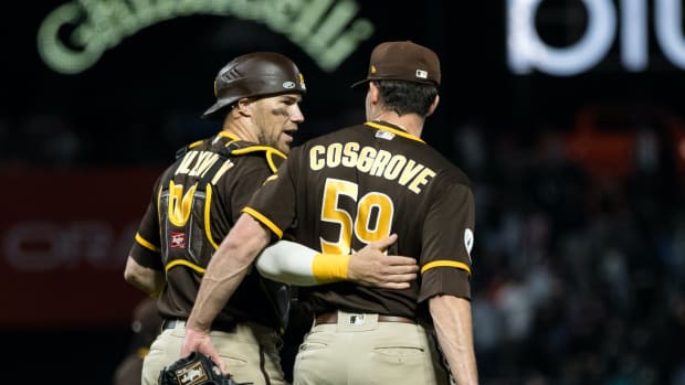 Sep 27, 2023; San Francisco, California, USA; San Diego Padres relief pitcher Tom Cosgrove (59) and catcher Brett Sullivan (29) celebrate their 5-2 win over the San Francisco Giants at Oracle Park.