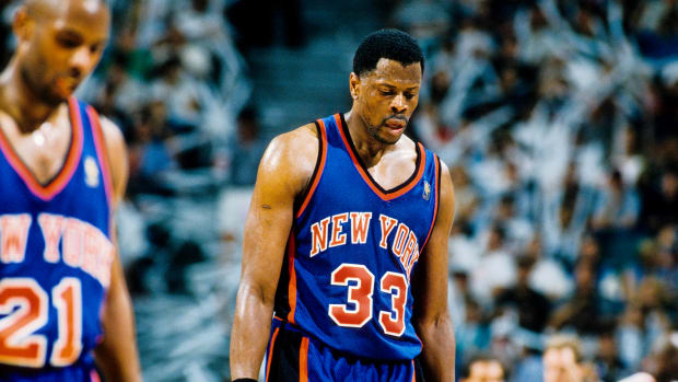 New York Knicks center Patrick Ewing (33) reacts on the court against the Miami Heat during the the first round of the 1997 NBA Playoffs at the Miami Arena.