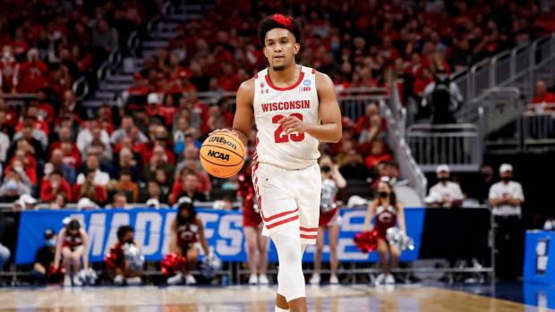 Chucky Hepburn of Wisconsin dribbles the ball up the court in the NCAA Tournament.