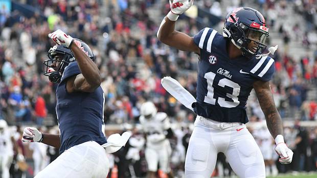 Mississippi wide receiver Braylon Sanders (13) and Mississippi wide receiver Jonathan Mingo (1) celebrate a touchdown against Mississippi State Bulldogs at Vaunt-Hemingway Stadium in Oxford, Miss. on Saturday, Nov. 28, 2020. (Bruce Newman)