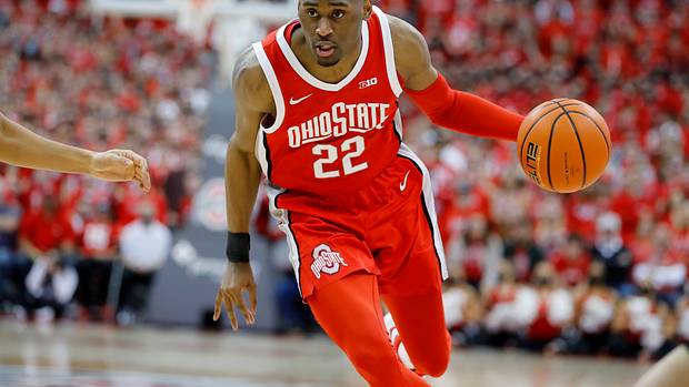 Ohio State Buckeyes guard Malaki Branham (22) dribbles past Michigan Wolverines forward Caleb Houstan (22) during the second half at Value City Arena.
