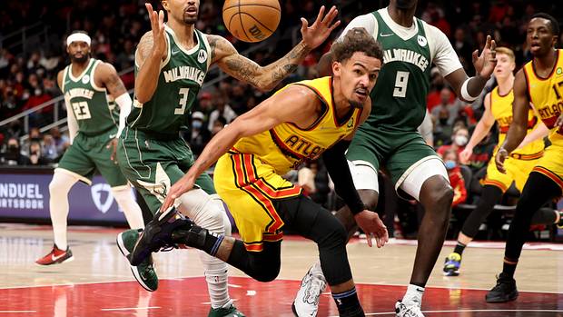 Trae Young loses control of the ball against the Bucks.