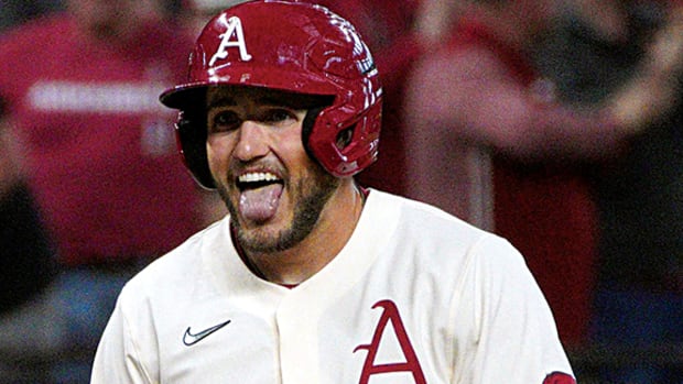 Arkansas outfield Jared Wegner gets excited during the College Baseball Showdown.