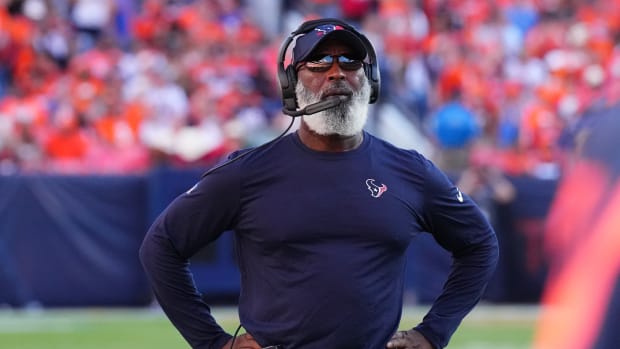 Houston Texans coach Lovie Smith earned his first loss with the team when the Denver Broncos staged a fourth quarter comeback in Week 2.